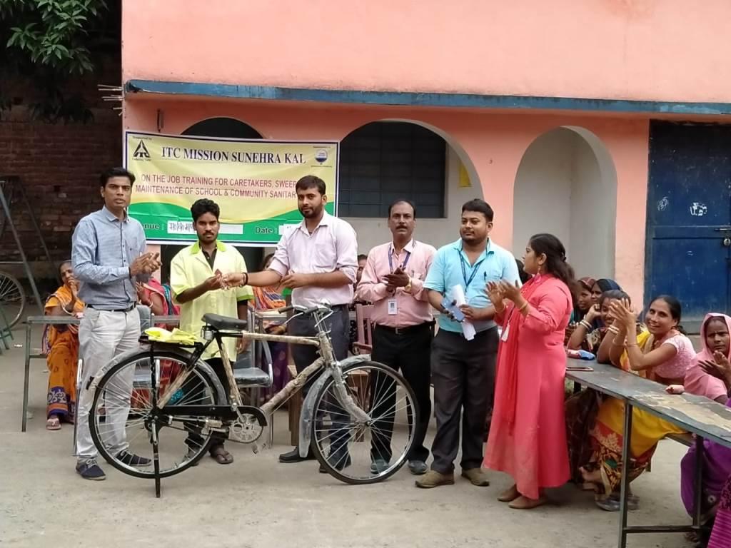 Cycle and Uniform distribution during an On the Job training to the caretakers, sweepers etc
